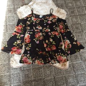 Sheer floral cold shoulder shirt.